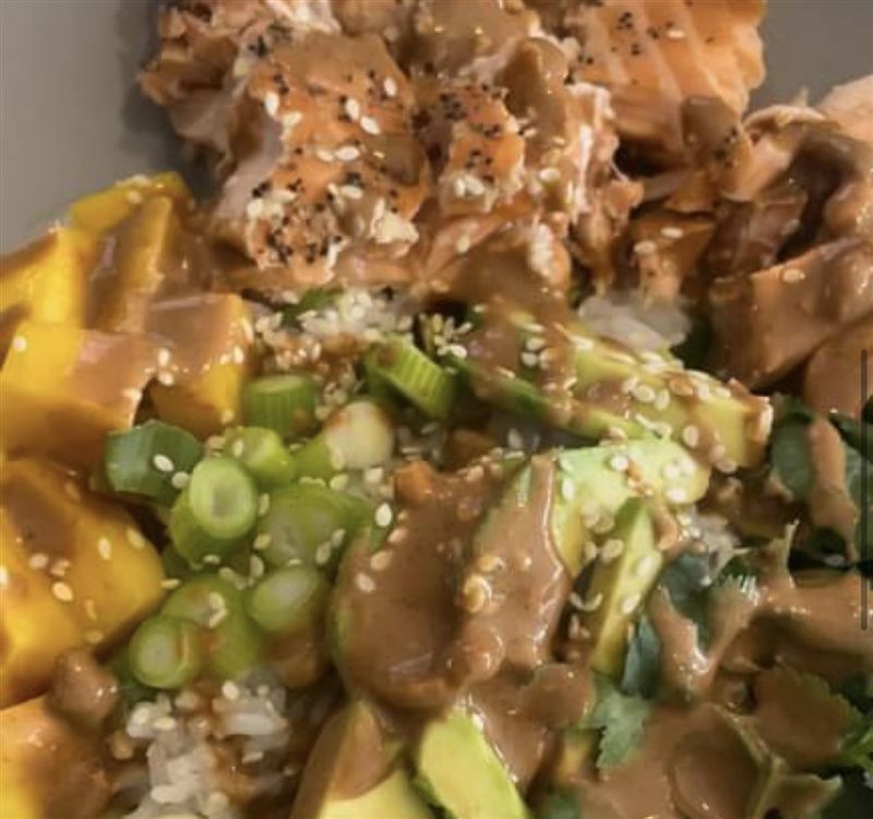 Salmon, avocado and mango nourish bowl